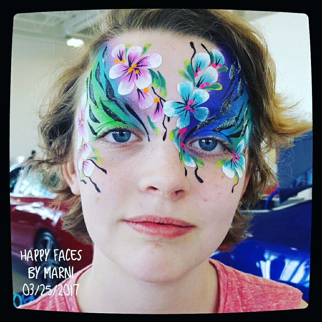 Abstract Flower Eye face paint design by Happy Faces by Marni, Calgary